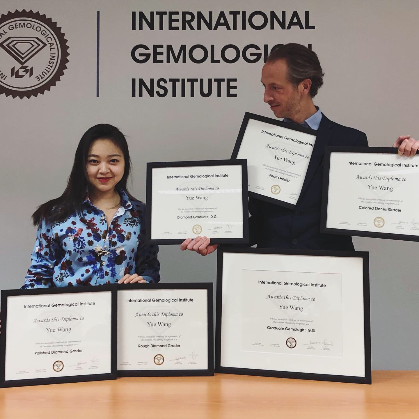 Jessica Wang with her original IGI gemmology diplomas