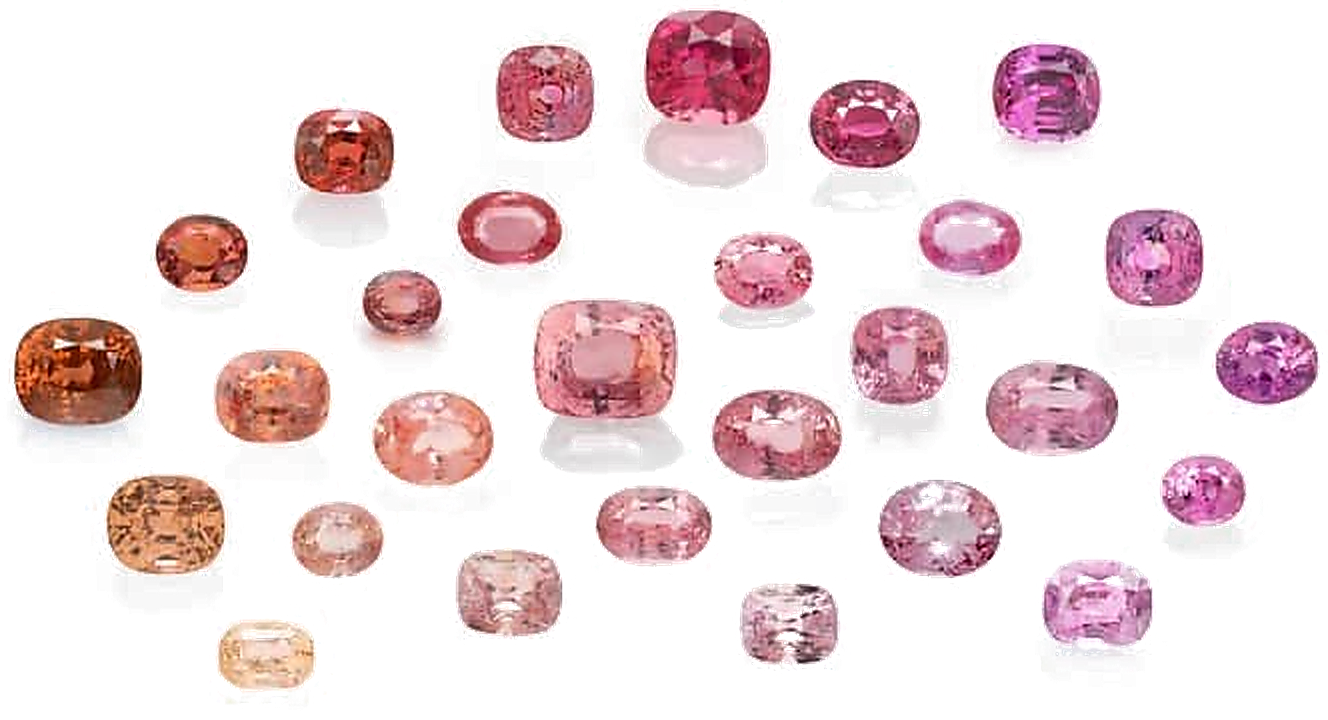 A collection of Padparadscha sapphires in pink and orange tones